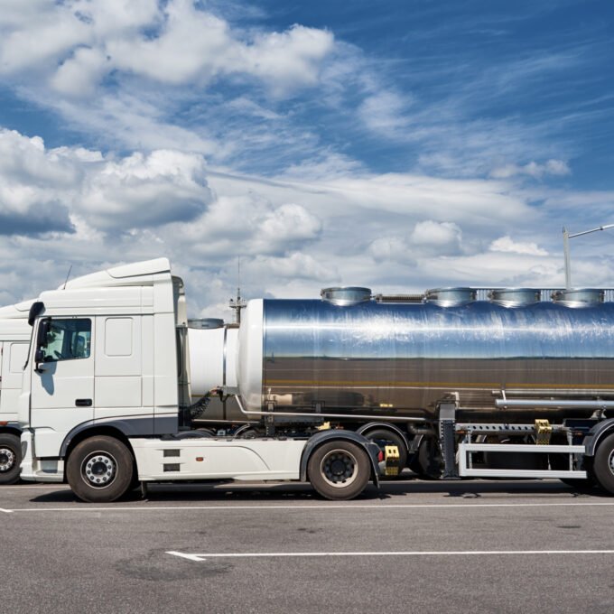 Trucks with tank trailer on parking lot Trucks with tank trailer on parking lot