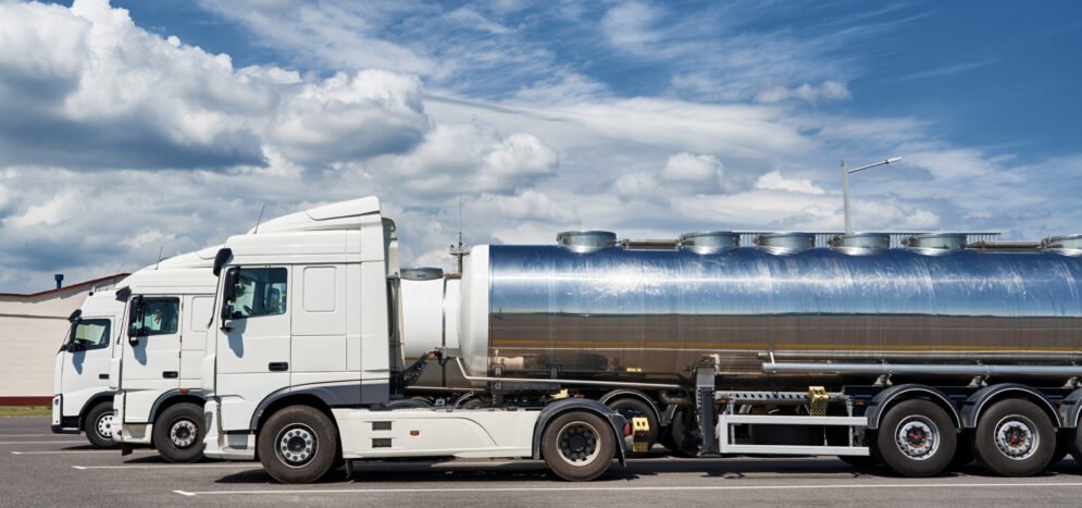 Trucks with tank trailer on parking lot